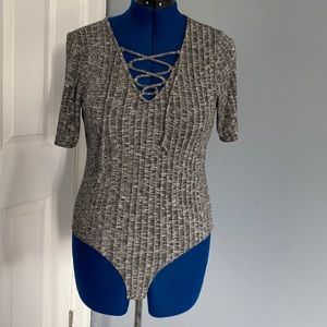 Grey bodysuit knitted look style.